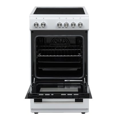 White VOX electric stove with open oven door and control knobs on top panel, designed for even cooking and turbo baking